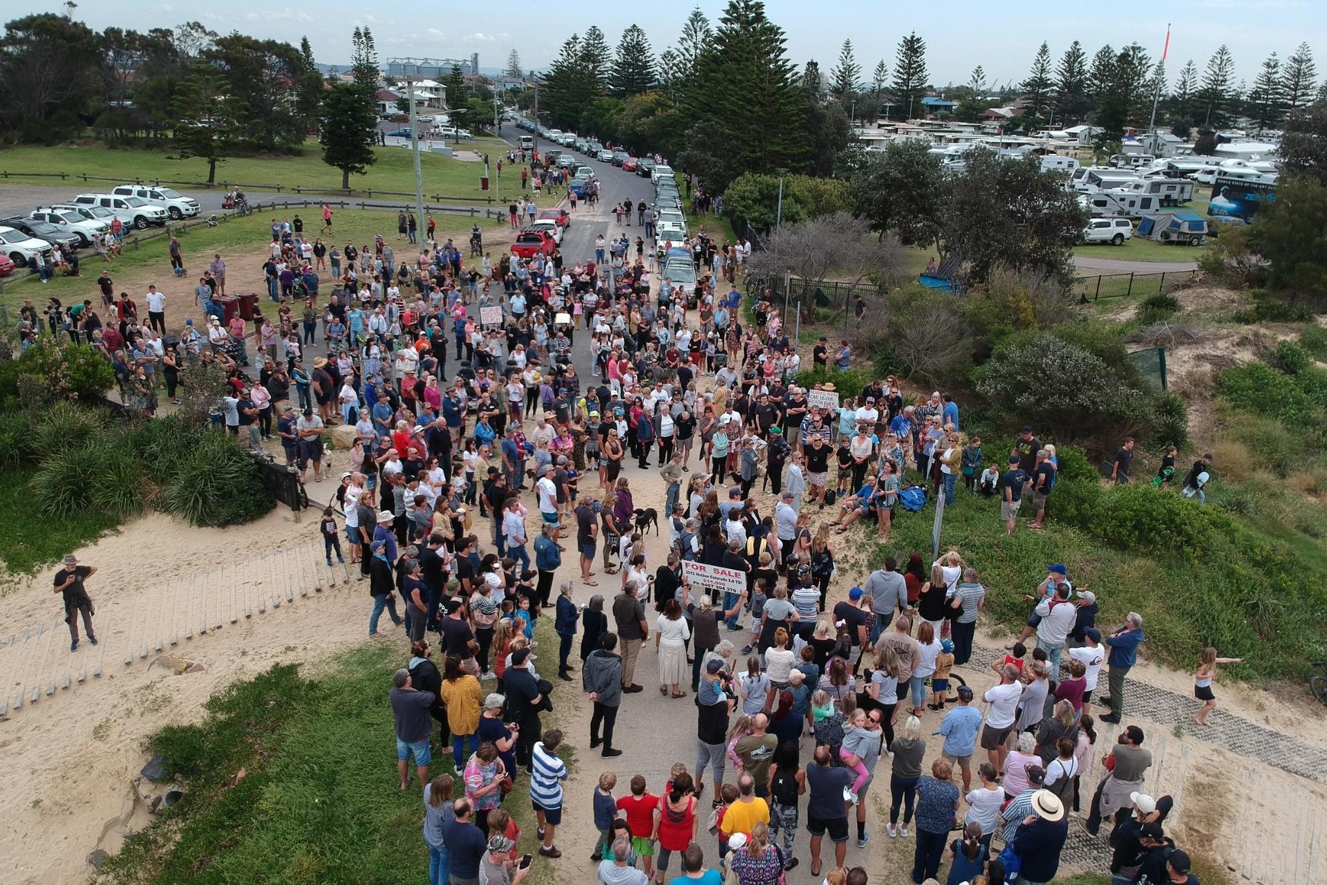 Stockton community gathering at the beachfront